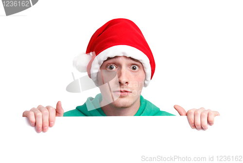 Image of Guy with santa hat and sign