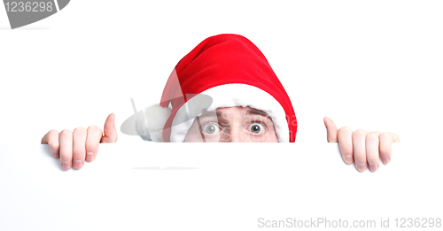Image of Guy with santa hat and sign