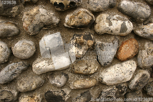 Image of large pebbles used to build a wall