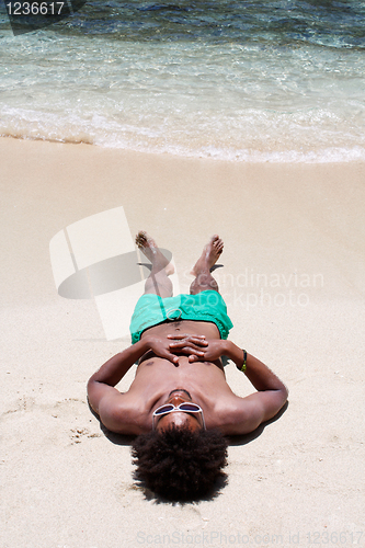 Image of Sleeping on beach