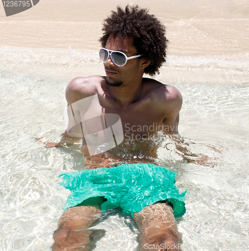 Image of Man enjoying the seaside