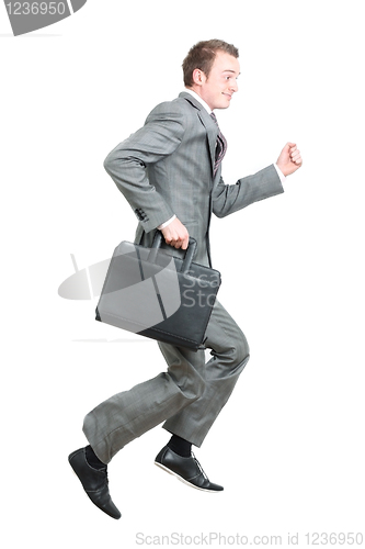 Image of Business man running to work