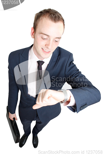 Image of Business man consulting watch