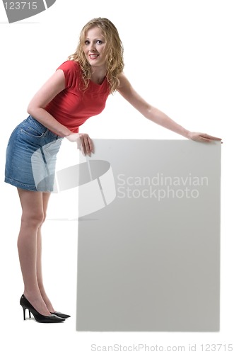 Image of Woman holding blank sign