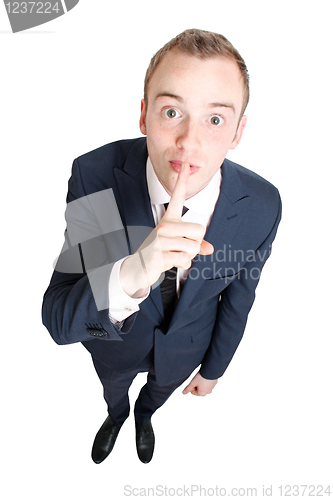 Image of Business man hushing