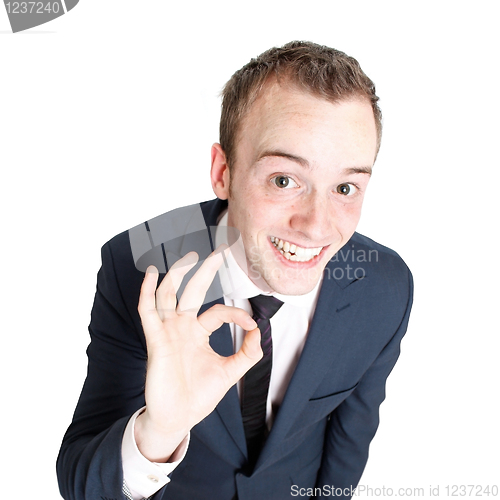 Image of A business man gesturing ok