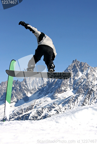 Image of Snowboarder jumping