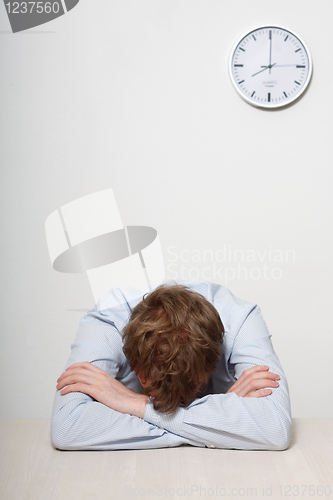 Image of Business man sleeping