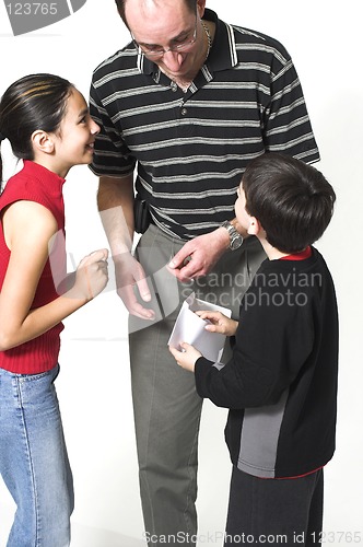 Image of dad and children on father's day