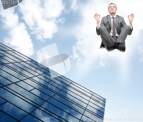 Image of Businessman meditating