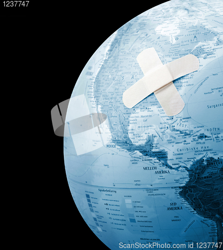 Image of Globe with bandage