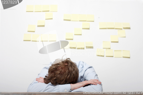 Image of Business man sleeping