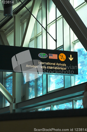 Image of airport sign and blue window
