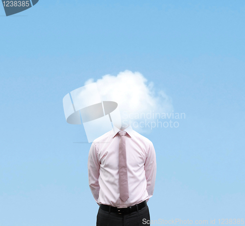 Image of Businessman in cloud
