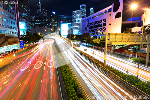 Image of traffic light stream and highrise bulidings