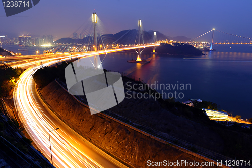 Image of highway and Ting Kau bridge at night