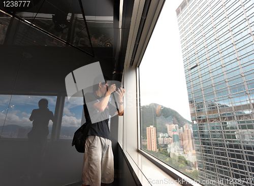 Image of man on observation deck in Hong Kong