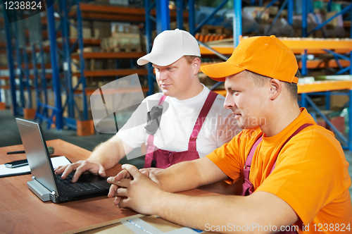 Image of manual workers in warehouse