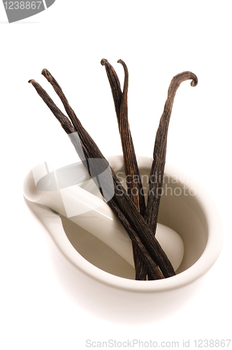 Image of mortar with vanilla pods 