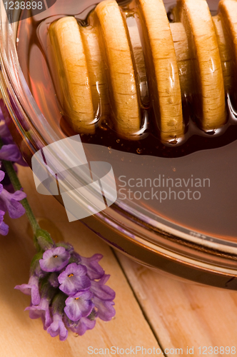 Image of lavender honey with fresh flowers. sweet food 