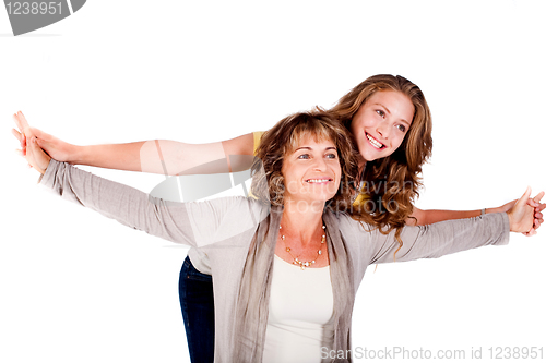 Image of Mature mother with her daughter, indoors