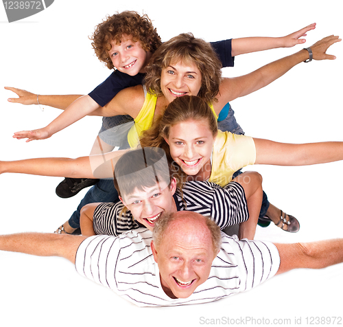 Image of Cheerful family having fun in the studio