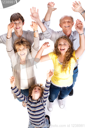 Image of Overhead view of cheerful family