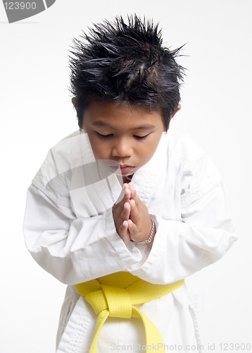 Image of Karate boy bowing