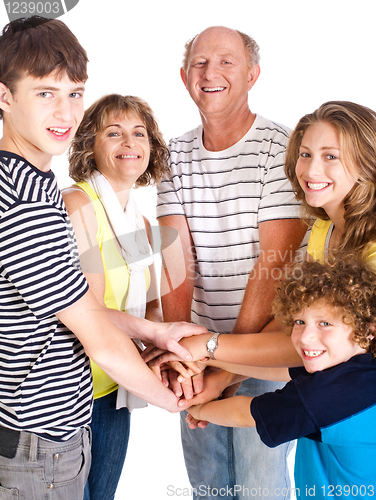 Image of United happy family smiling at camera