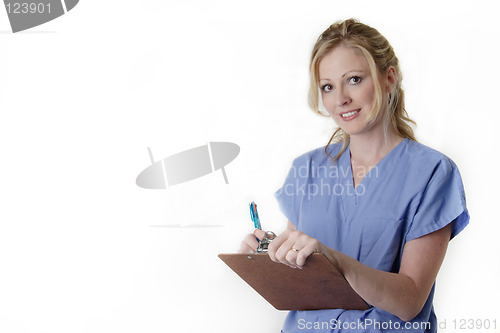 Image of Friendly nurse holding chart