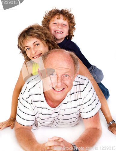 Image of Grandparent lying on floor with grandson