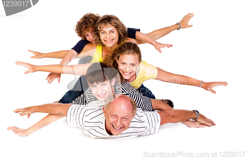 Image of Cheerful family having fun in the studio