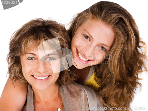 Image of Close-up of smiling elder mum and daughter