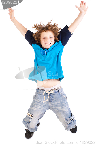 Image of Young and attractive kid jumping high