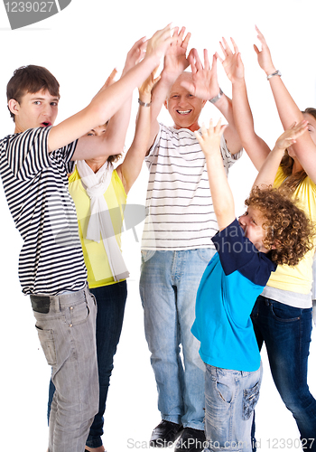 Image of Smiling caucasian american family enjoying, indoors