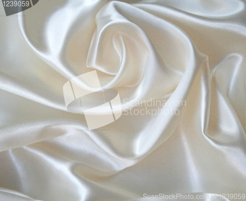 Image of Smooth elegant white silk as background 