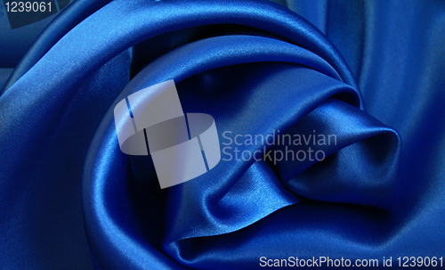 Image of Smooth elegant blue silk as background 