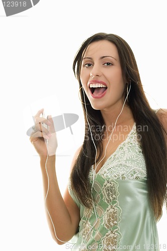 Image of Recreational fun -  woman with music player