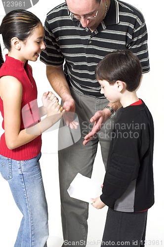 Image of dad and kids on father's day