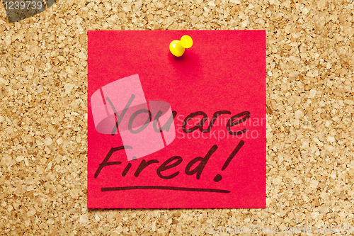 Image of Red sticky note 'You are Fired!' 