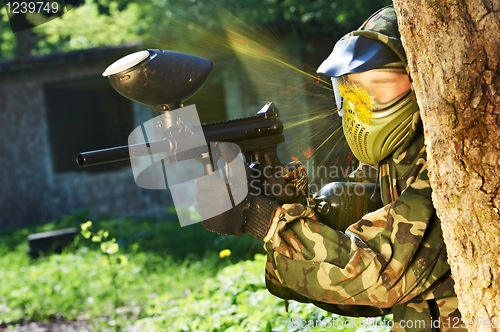 Image of paintball player direct hit