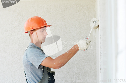 Image of builder facade plasterer worker