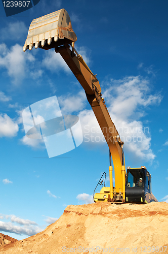 Image of track-type loader excavator at construction area