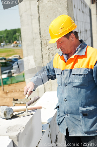 Image of construction mason worker bricklayer