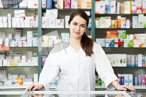 Image of Pharmacy chemist woman in drugstore