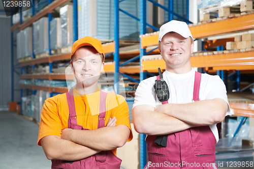 Image of manual workers crew in warehouse