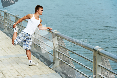 Image of Stretching exercises before sport jogging