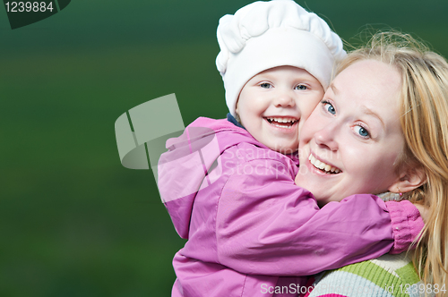 Image of mother and child outdoors