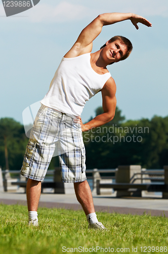 Image of Stretching exercises before sport jogging