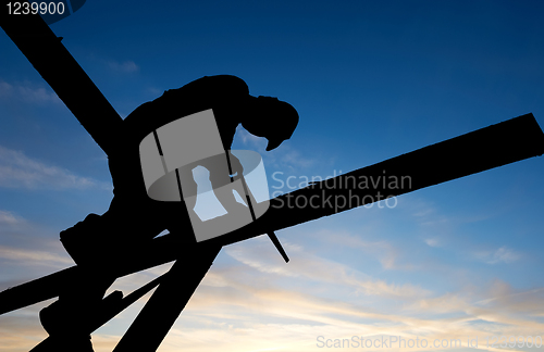 Image of builder at roofing works